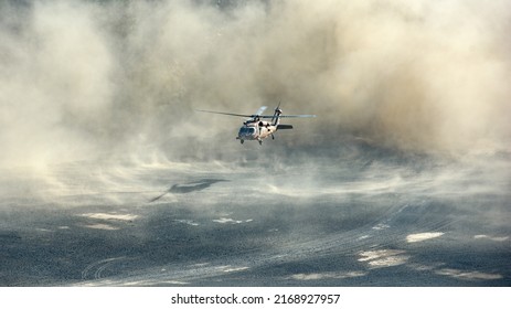 AMIANTOS, CYPRUS - JUNE 2, 2022: An Israeli Sikorsky UH-60 Black Hawk helicopter taking off in heavy clouds of dust during joint Cyprus-Israel military exercise “Agapinor 2022” - Shutterstock ID 2168927957