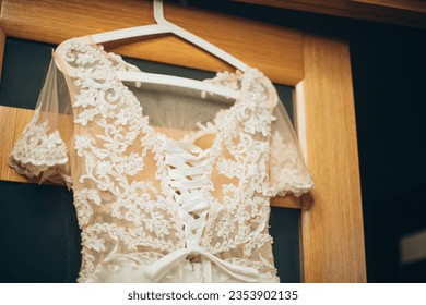 Amidst sunlit splendor, the gown's bodice radiates grace, embodying the bride's serenity. - Powered by Shutterstock