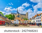 Amiens old town Saint-Leu quarter with colorful houses, restaurants and Amiens Cathedral Basilica of Our Lady Roman Catholic church in historical city centre, Hauts-de-France Region, Northern France