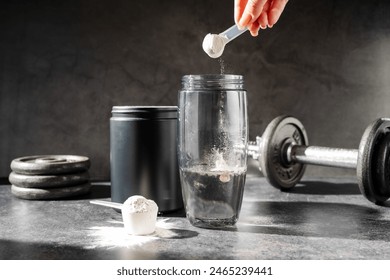 Amino acid food supplement, creatine powder in a measuring scoop, Sports nutrition  - Powered by Shutterstock