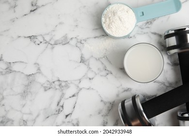 Amino Acid Shake, Powder And Dumbbells On White Marble Table, Flat Lay. Space For Text