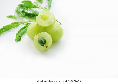 amla green fruits on white background. 