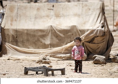 AMMAN, JORDAN, 14 JUNE 2015, A Syrian Refugee Child In Front Of His Tent In Zaatari Refugee Camp.