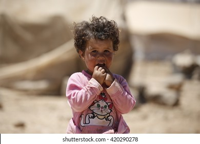 AMMAN, JORDAN, 14 JUNE 2015, A Syrian Refugee Child In Front Of His Tent In Zaatari Refugee Camp.
