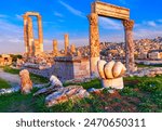 Amman Jordan: The fallen hand and the temple of hercules on the amman citadel in sunset lights. Middle east travel destination