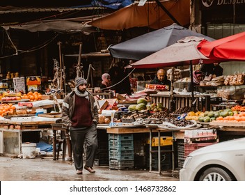 Amman, Jordan, February 27, 2019 Street View Of Amman Jordan With Buildings, Cars, Shops, Market, Traffic And People