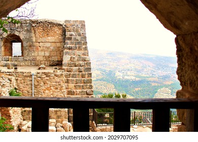 AMMAN, JORDAN - Jul 24, 2021: A view of an antient castle with the green hills in the background in Amman, Jordan
