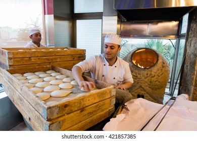 AMMAN, JORDAN - March 17, 2016 - Traditional Bread Making Activity For A Commercial Food Chain In Jordan.