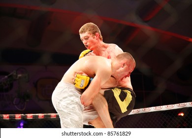 AMMAN, JORDAN - SEPTEMBER 8 : Jack Hermansson (Left) Defeats Mike Ling (Right) By Knockout At 3:30 Of Round 1, Cage Warriors Fight Night 2, Fight Card On September 8, 2011 In Amman, Jordan