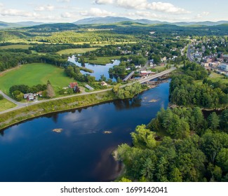 The Ammonoosuc River flows into the Connecticut River in the village of Woodsville, Haverhill, New Hampshire