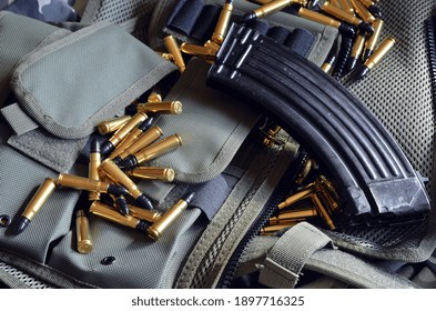 Ammunition 7,62*39.Tactical unloading vest as background. October 23, 2020.Kiev,Ukraine