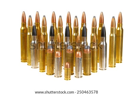 Ammunition of various types and sizes from 320 Auto to 300 Win Mag, arranged in the form of a triangle, isolated on white