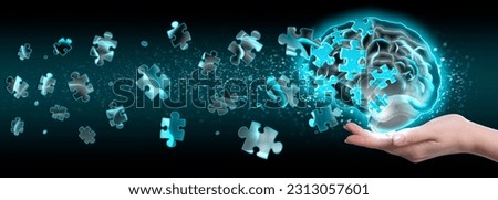 Amnesia. Woman holding illustration of brain with flying out puzzle pieces on black background, closeup. Banner design