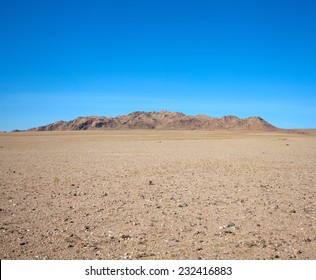 Among The Rocky Hill Of Dunes In The Gobi Desert