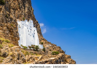 Amorgos Whitewashed Monastery On The Cliff Side, Greece.