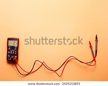 Amp ,amp electric , amp meter on brown background