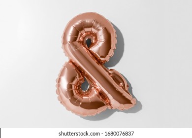 Ampersand symbol or &, Rose gold foil balloon alphabet isolated on a white background with Clipping Path