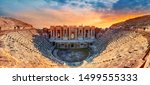 Amphitheater in ancient city of Hierapolis. Dramatic sunset sky. Unesco Cultural Heritage Monument. Pamukkale, Turkey