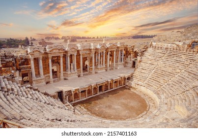 Amphitheater in Hierapolis ancient city in Pamukkale Turkey banner sunset. - Shutterstock ID 2157401163