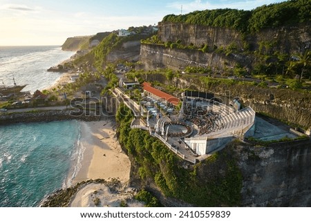 The amphitheater of the local show Kecak Dance at Melasti Beach over a cliff near the ocean on the island of Bali