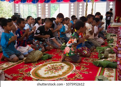 Amphoe Mueang, Buri Ram/ Thailand - April 01, 2018: Group Of Buddhist  Receive The Five Precepts From Buddhist Monk At Wat Thong Sa Wang.
