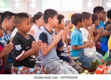 Amphoe Mueang, Buri Ram/ Thailand - April 01, 2018: Group Of Buddhist  Receive The Five Precepts From Buddhist Monk At Wat Thong Sa Wang.
