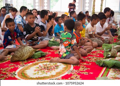 Amphoe Mueang, Buri Ram/ Thailand - April 01, 2018: Group Of Buddhist  Receive The Five Precepts From Buddhist Monk At Wat Thong Sa Wang.
