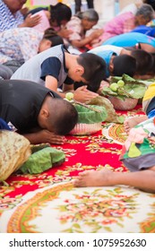 Amphoe Mueang, Buri Ram/ Thailand - April 01, 2018: Group Of Buddhist  Receive The Five Precepts From Buddhist Monk At Wat Thong Sa Wang.
