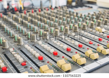 Amplifier and equaliser mixer switch of sound equipment. Selective focus.