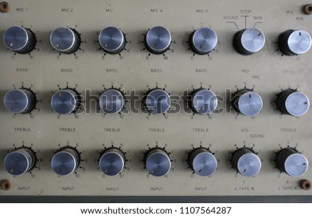Amplifier and equaliser mixer switch of sound equipment. Selective focus.