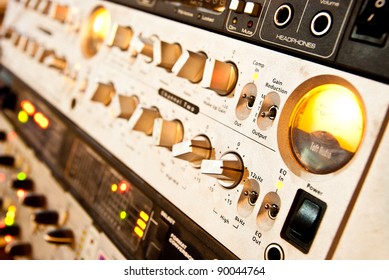 amplifier studio equipment with knobs and lamps