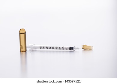 ampule with syringe - Shutterstock ID 143597521