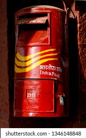 Amreli Gujarat India  Sep. 30 2009  Close Up Of Traditional Red Color Old Indian Mailbox Or Postbox Letter Box At Amreli Railway Station