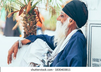 Amritsar, India - AUGUST 15:  Portrait of an Old Sikh sitting at Golden Temple (Harmandir Sahib) on August 15, 2016 in Amritsar, Panjab, India.