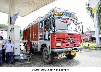 Amritsar, India, September 5, 2010: Big Indian Truck With His Driver On A Gasoline Station.