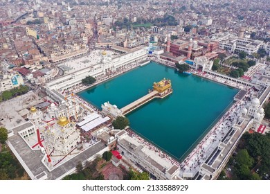 Amritsar, Panjab, India -  March 06, 2022: Aerial View Of Golden Temple Located At Amritsar, Panjab, India