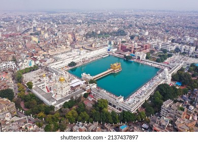 Amritsar, Panjab, India -  March 06, 2022: Aerial View Of Golden Temple Located At Amritsar, Panjab, India