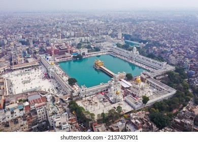 Amritsar, Panjab, India -  March 06, 2022: Aerial View Of Golden Temple Located At Amritsar, Panjab, India