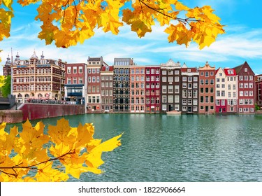 Amsterdam Architecture At Damrak Canal In Autumn, Netherlands