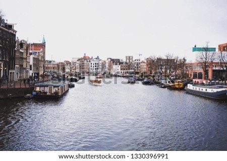 Image, Stock Photo Tranquil Amsterdam canal with iconic narrow houses