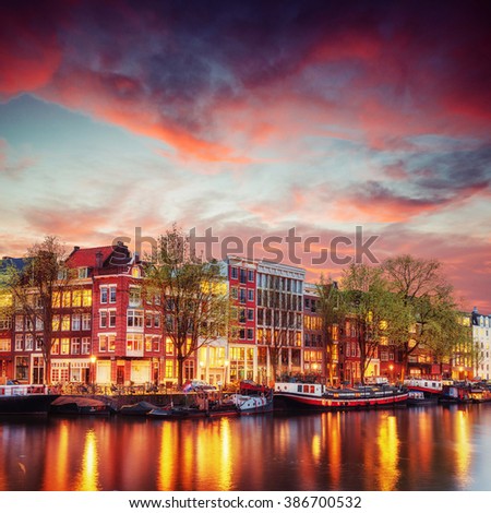 Amsterdam canal on the west. Amsterdam is the capital and most densely populated city in the Netherlands.