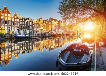 Amsterdam canal at sunset. Amsterdam is the capital and most populous city in Netherlands.