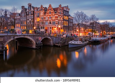 Amsterdam canals Netherlands, Amsterdam Holland during sunset evening during wintertime in the Netherlands. Europe