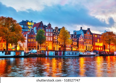 Amsterdam City View With Amstel River At Sunset