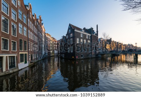 Similar – Schöne Architektur niederländischer Häuser und Hausboote am Amsterdamer Kanal im Herbst