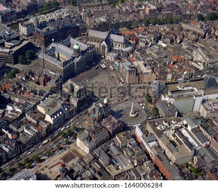 Amsterdam, Holland, August 24 - 1987: Historical aerial photo of the Dam square and royal place in Amsterdam