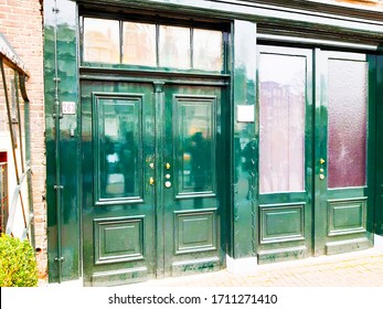 AMSTERDAM, HOLLAND / NETHERLANDS - OCTOBER 2 2019 : Ancient Green Door Of The Old House Of Anna Frank In Amsterdam