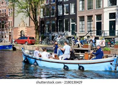 Amsterdam, The Netherlands - 12 June 2022: Canal Trip In Centre Of Dutch Capital Amsterdam On The Summer Day. 