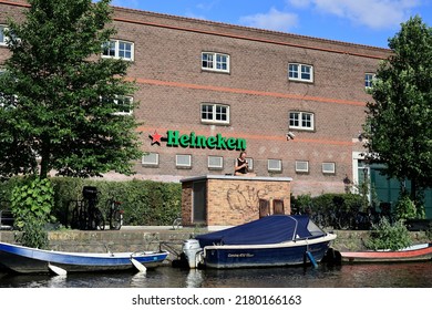 Amsterdam, The Netherlands - 12 June 2022: Heineken Logo Hanged On Brick Wall. Amsterdam, Netherlands.