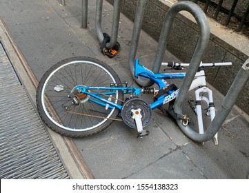 Amsterdam / Netherlands - 2019: Chained Bike In The Parking Spot Without Front Wheel